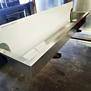 Long fabricated stainless steel trough in the workshop
